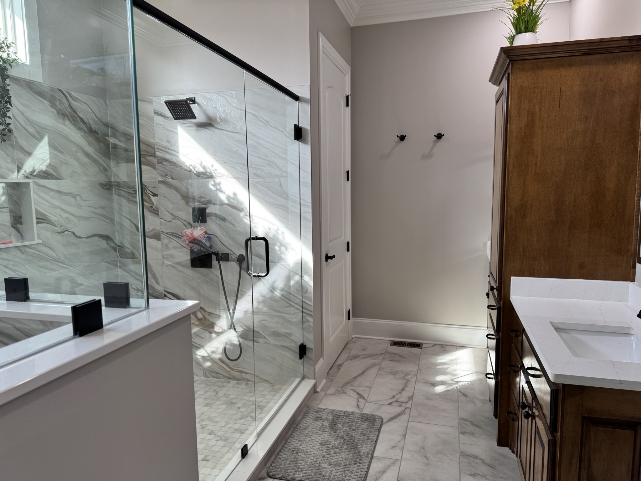7402 Cold Harbor Court Fairview, TN 37062 - Photo 22 of 48 a bathroom with a sink and mirror