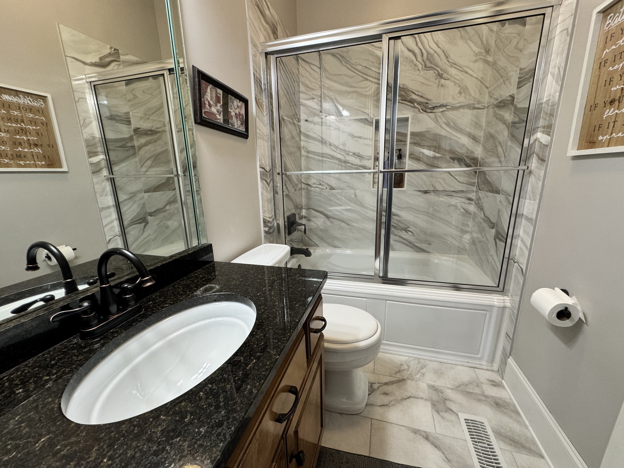 7402 Cold Harbor Court Fairview, TN 37062 - Photo 25 of 48 a bathroom with a sink toilet and shower