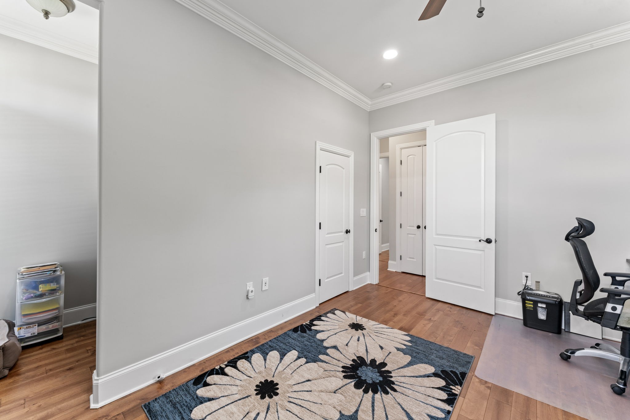 7402 Cold Harbor Court Fairview, TN 37062 - Photo 27 of 48 a bedroom with furniture and wooden floor