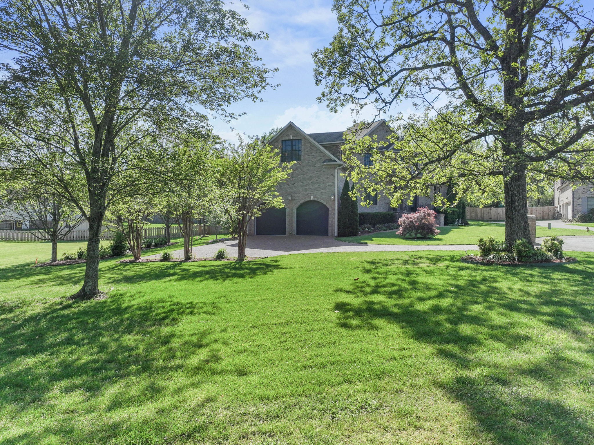 7402 Cold Harbor Court Fairview, TN 37062 - Photo 46 of 48 a view of a house with a backyard
