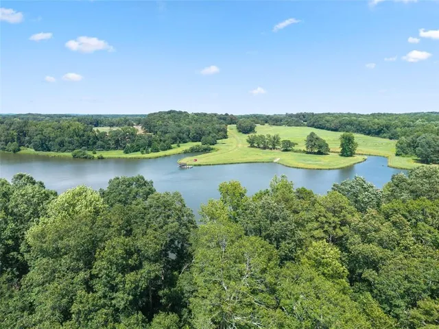 a view of a golf course with a swimming pool