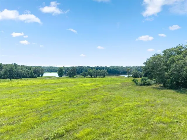 a view of an ocean and a yard