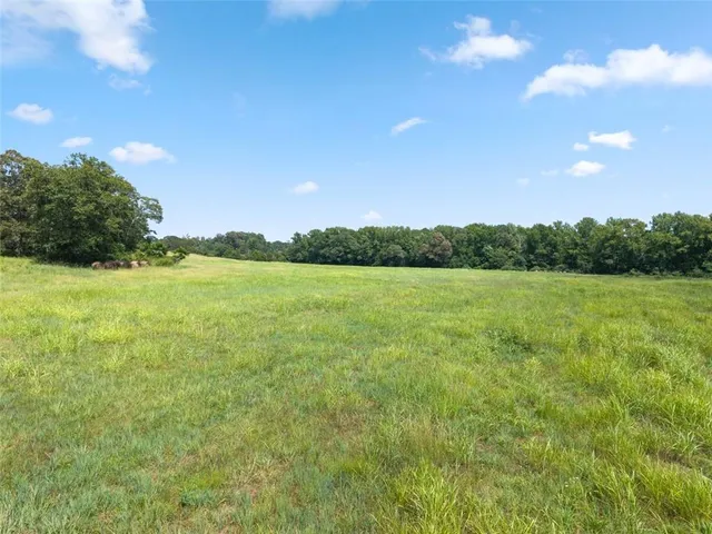 a view of a lake view with a big yard