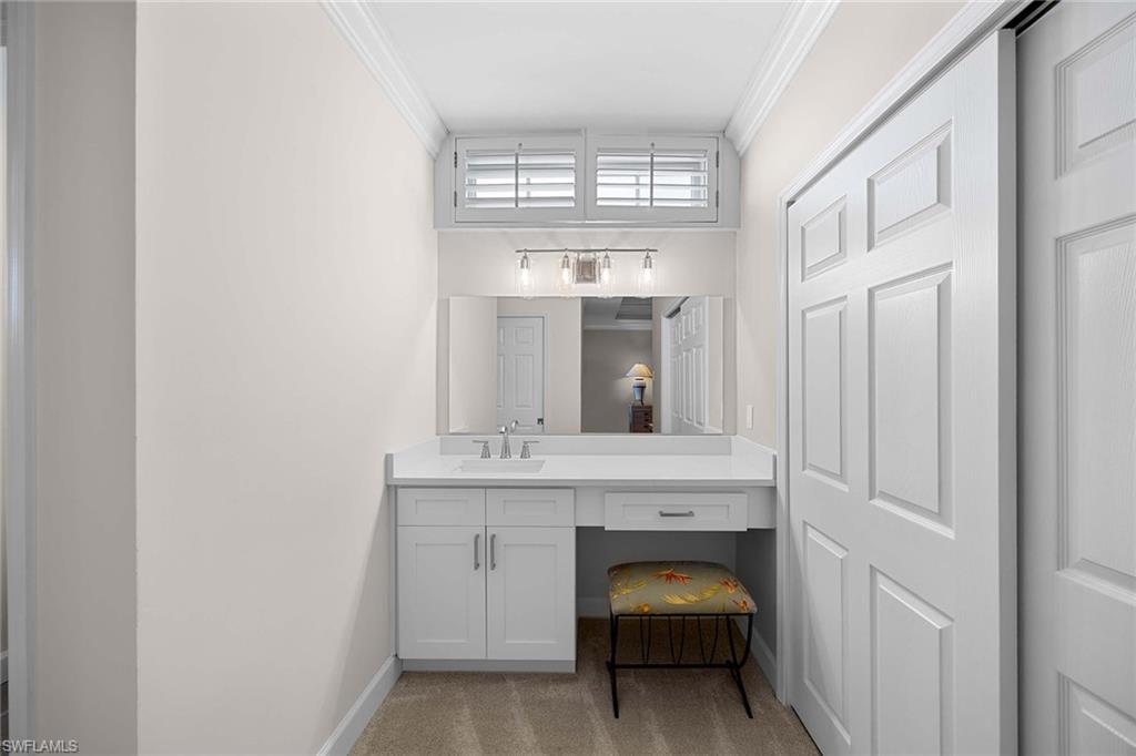 828 Hideaway Circle East, Unit 4434 Marco Island, FL 34145 - Photo 23 of 50 a view of an empty room with fireplace and a window