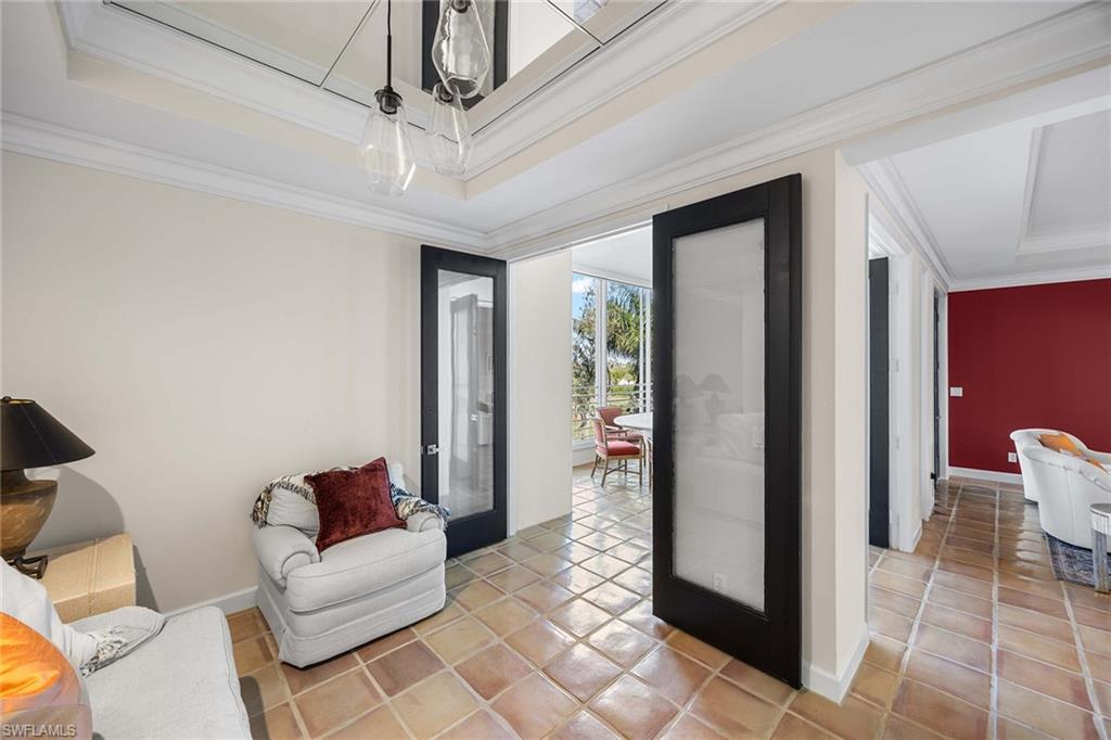 828 Hideaway Circle East, Unit 4434 Marco Island, FL 34145 - Photo 32 of 50 a living room with furniture and a ceiling fan