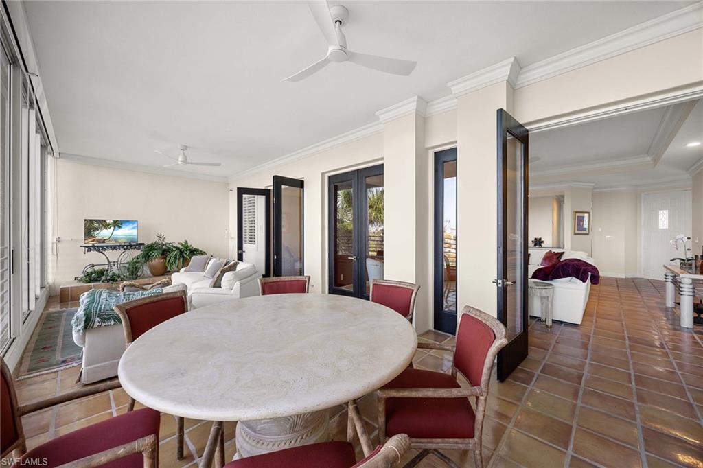 828 Hideaway Circle East, Unit 4434 Marco Island, FL 34145 - Photo 34 of 50 a view of a dining room with furniture