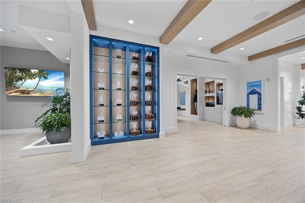 828 Hideaway Circle East, Unit 4434 Marco Island, FL 34145 - Photo 38 of 50 a view of an empty room with a potted plant and more windows