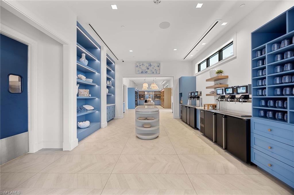 828 Hideaway Circle East, Unit 4434 Marco Island, FL 34145 - Photo 40 of 50 a kitchen with stainless steel appliances cabinets and a kitchen