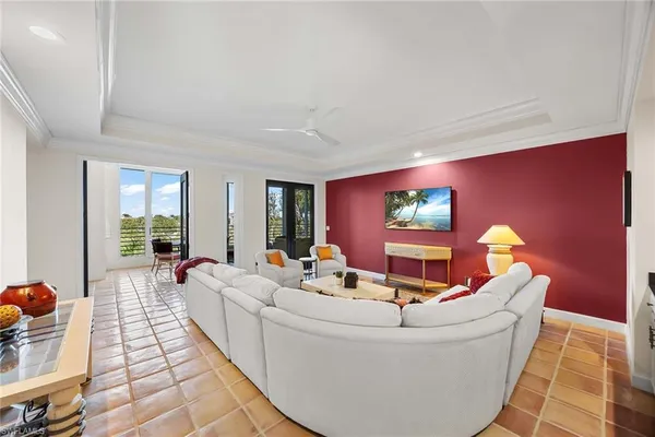 a living room with furniture and a table