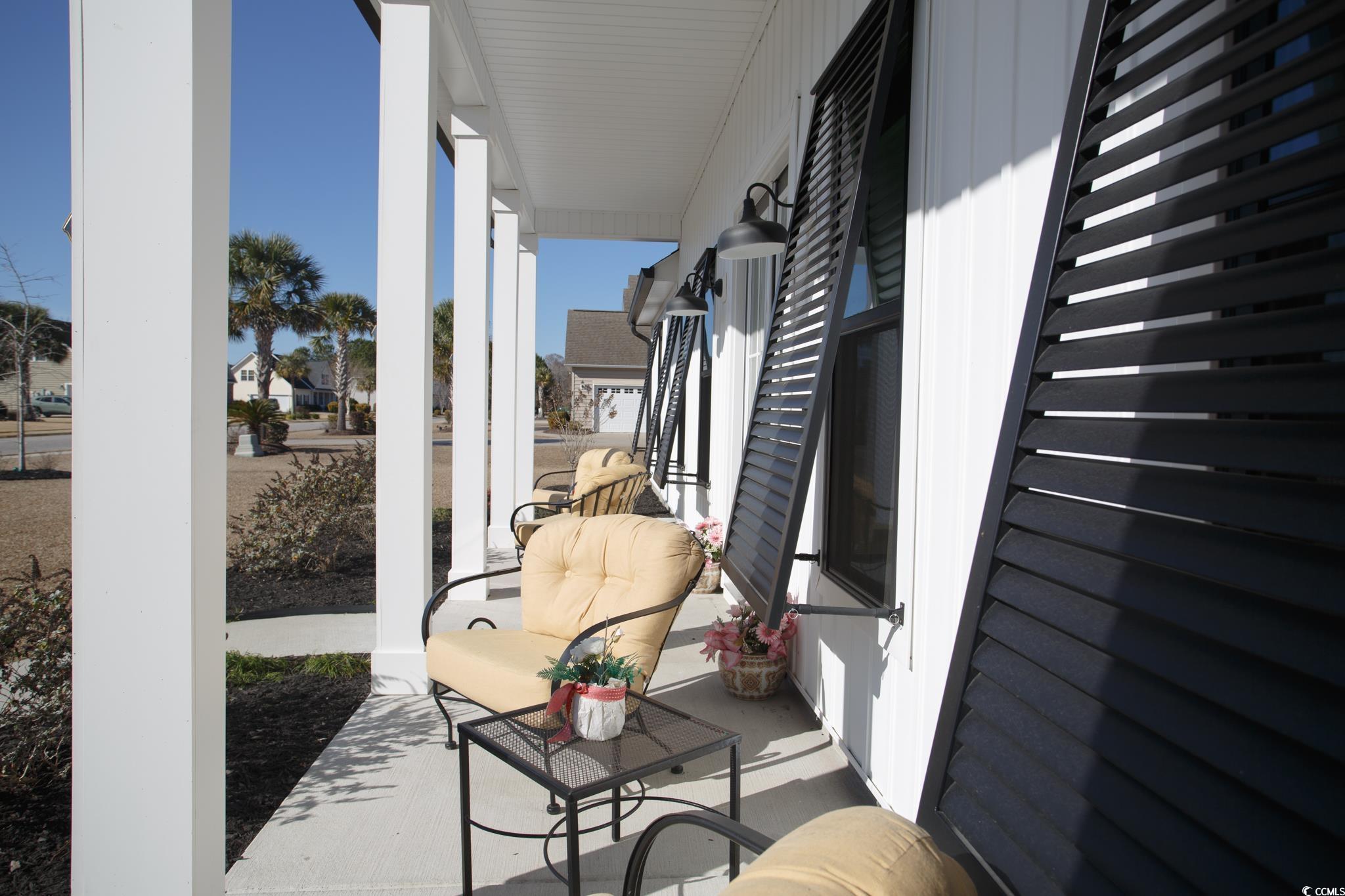 261 Marsh Tacky Loop Myrtle Beach, SC 29588 - Photo 3 of 40 Balcony with a porch