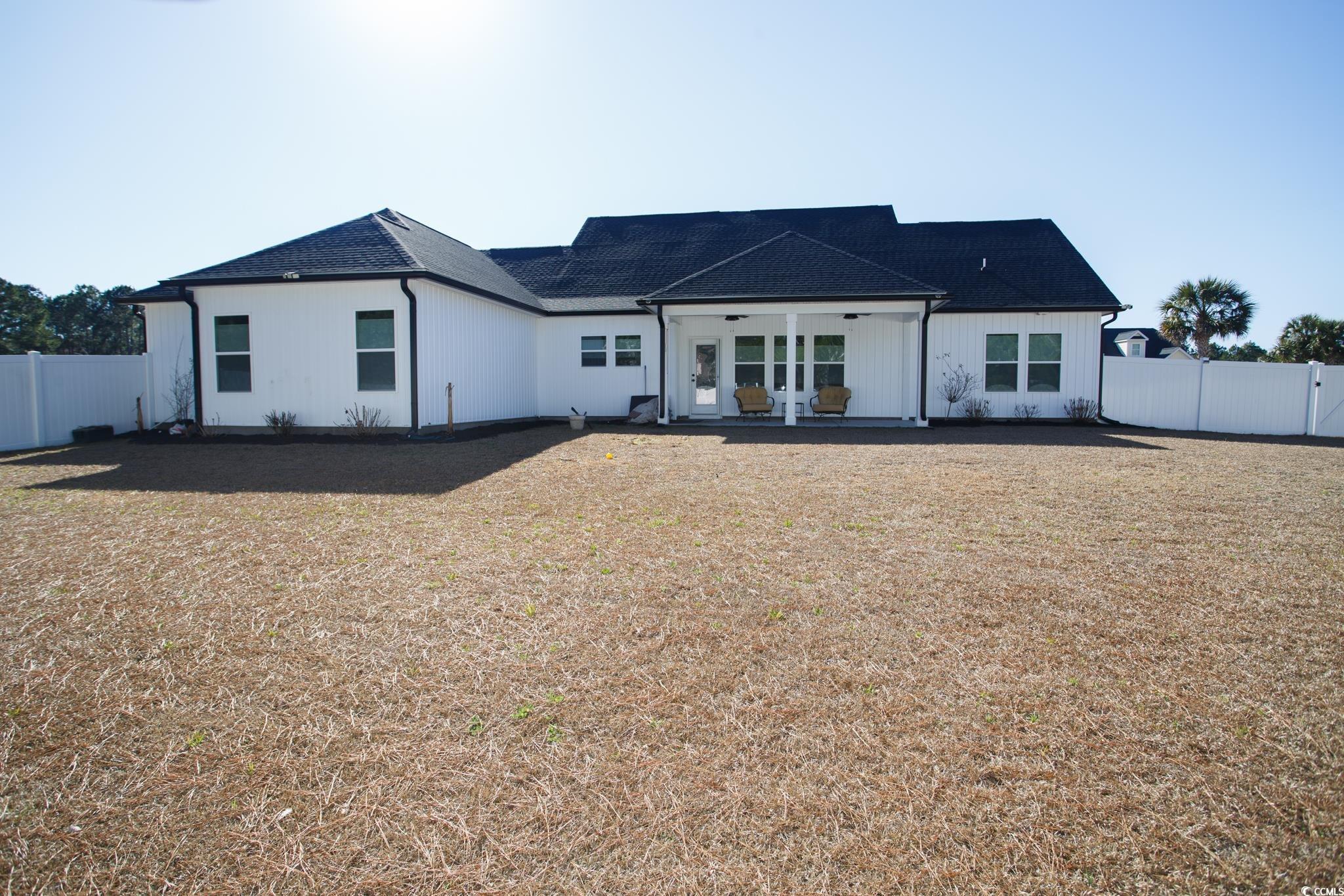 261 Marsh Tacky Loop Myrtle Beach, SC 29588 - Photo 36 of 40 View of rear view of property