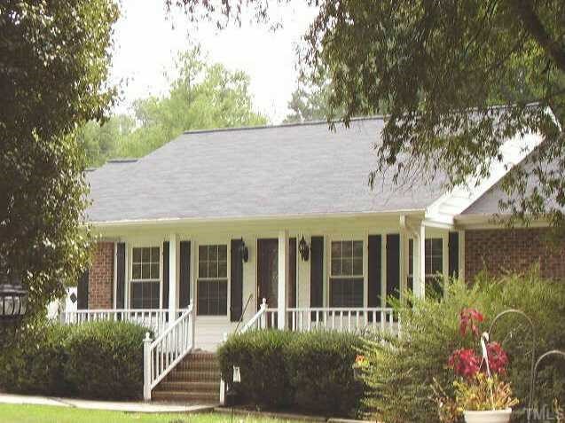 2777 Burlington Road Roxboro, NC 27574 - Photo 1 of 11 front view of a house with a yard