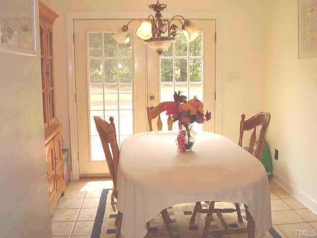 2777 Burlington Road Roxboro, NC 27574 - Photo 4 of 11 a dining room with furniture and window