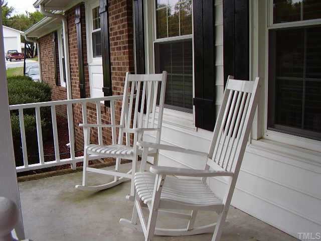 2777 Burlington Road Roxboro, NC 27574 - Photo 8 of 11 a view of two chairs in the balcony