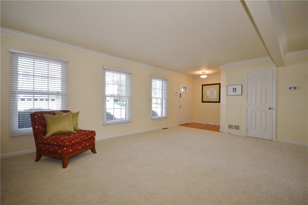 11 Castle View Drive McKees Rocks, PA 15136 - Photo 3 of 25 Front entry into open-concept living and dining room, includes powder room