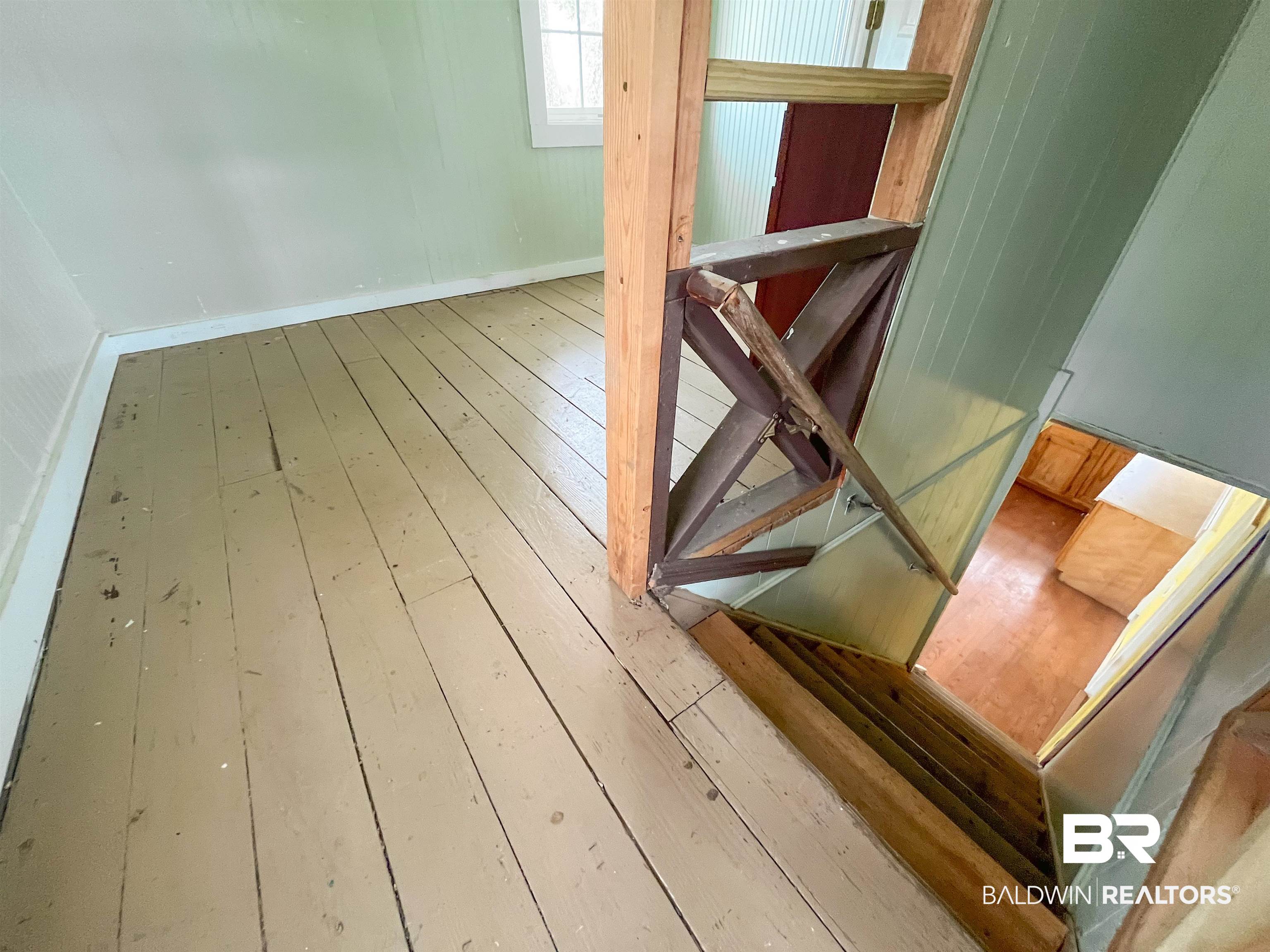 12956 Bender Road Foley, AL 36535 - Photo 27 of 46 Staircase with wood-type flooring