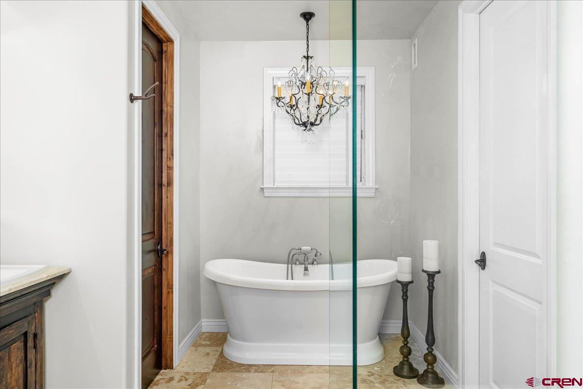 240 Vista Drive Ridgway, CO 81432 - Photo 21 of 41 a bathroom with a sink and a mirror