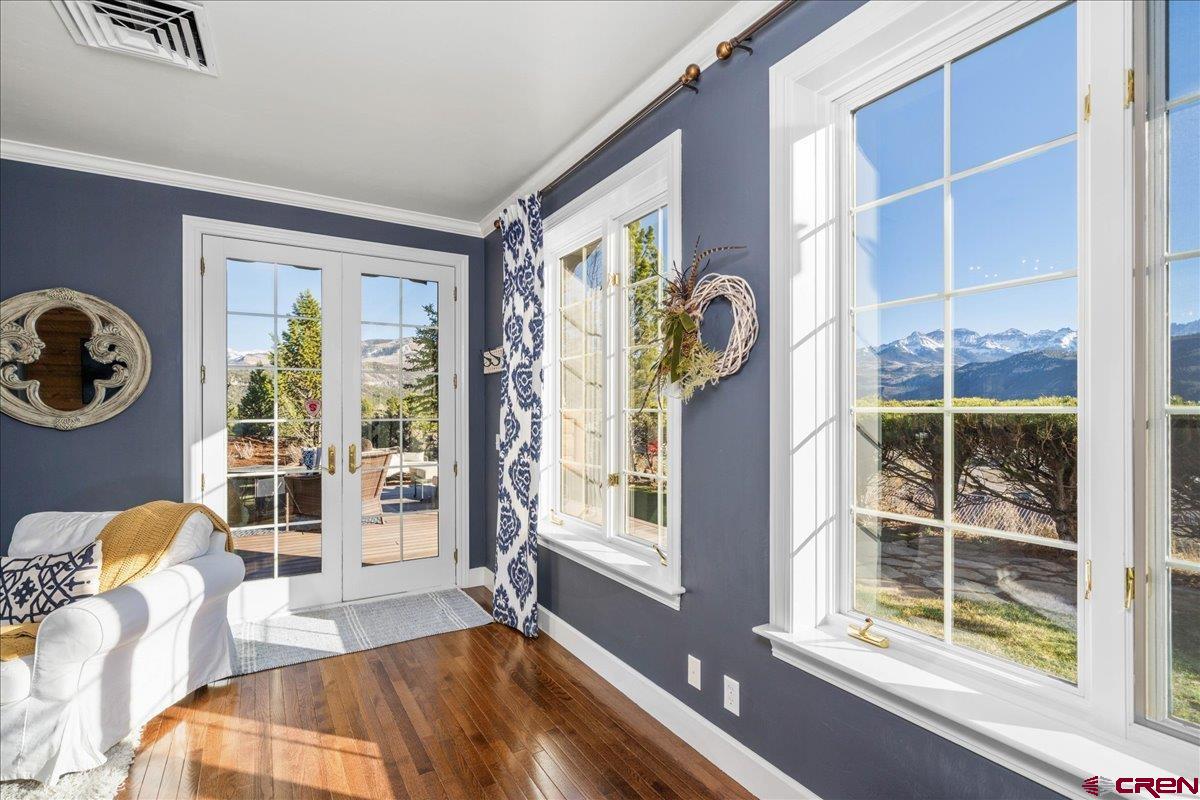 240 Vista Drive Ridgway, CO 81432 - Photo 25 of 41 a bedroom with furniture and a large window