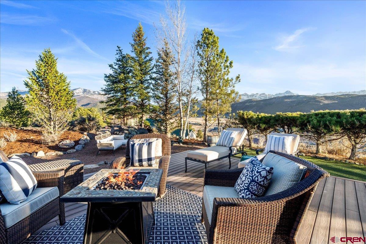240 Vista Drive Ridgway, CO 81432 - Photo 38 of 41 a outdoor living space with furniture and a fireplace