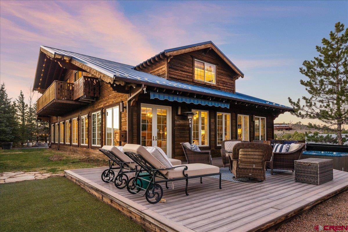 240 Vista Drive Ridgway, CO 81432 - Photo 4 of 41 a view of a chair and tables in the patio
