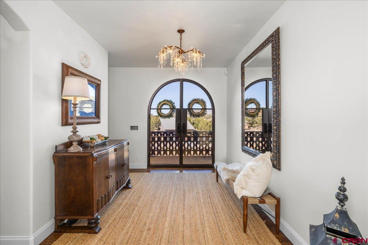 240 Vista Drive Ridgway, CO 81432 - Photo 5 of 41 a view of a room with window wooden floor and chandelier