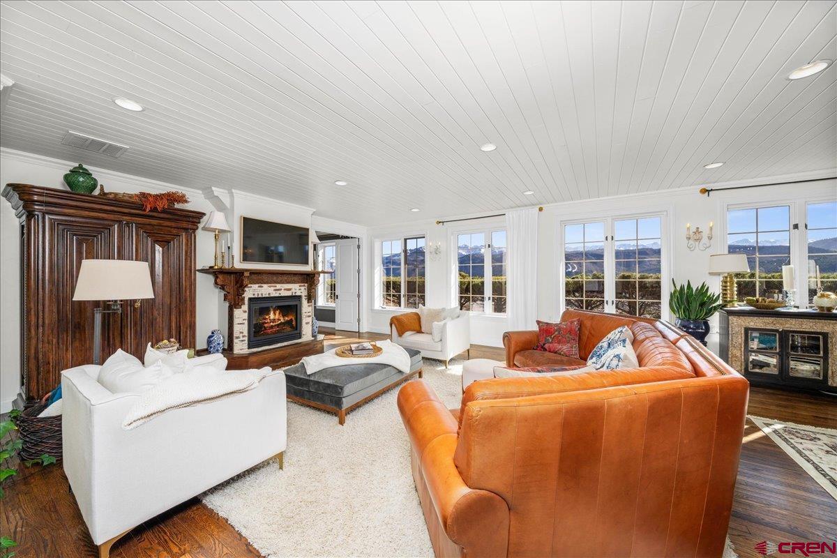 240 Vista Drive Ridgway, CO 81432 - Photo 8 of 41 a living room with fireplace furniture and a fireplace