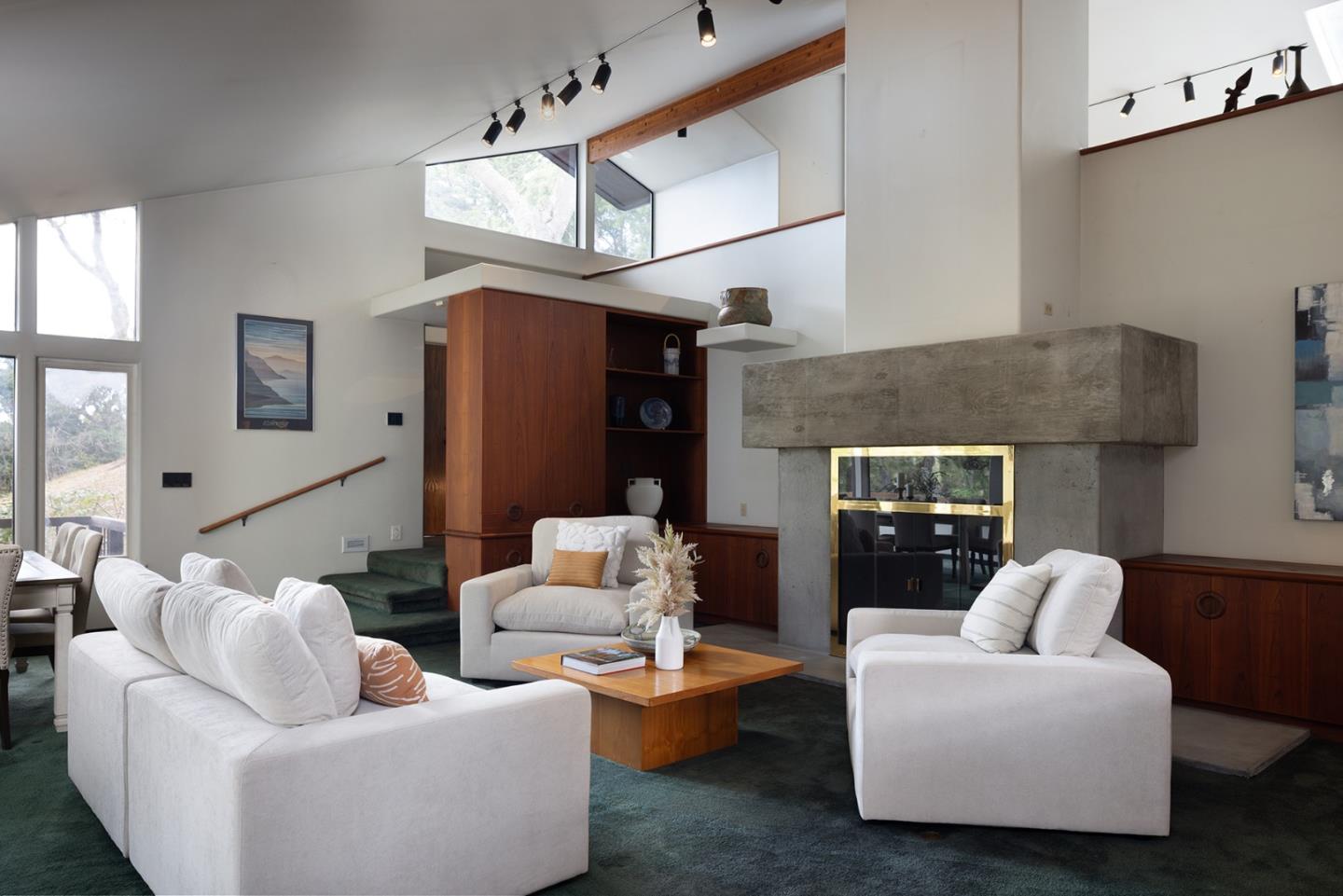 571 Viejo Road Carmel, CA 93923 - Photo 29 of 41 a living room with furniture and a fireplace