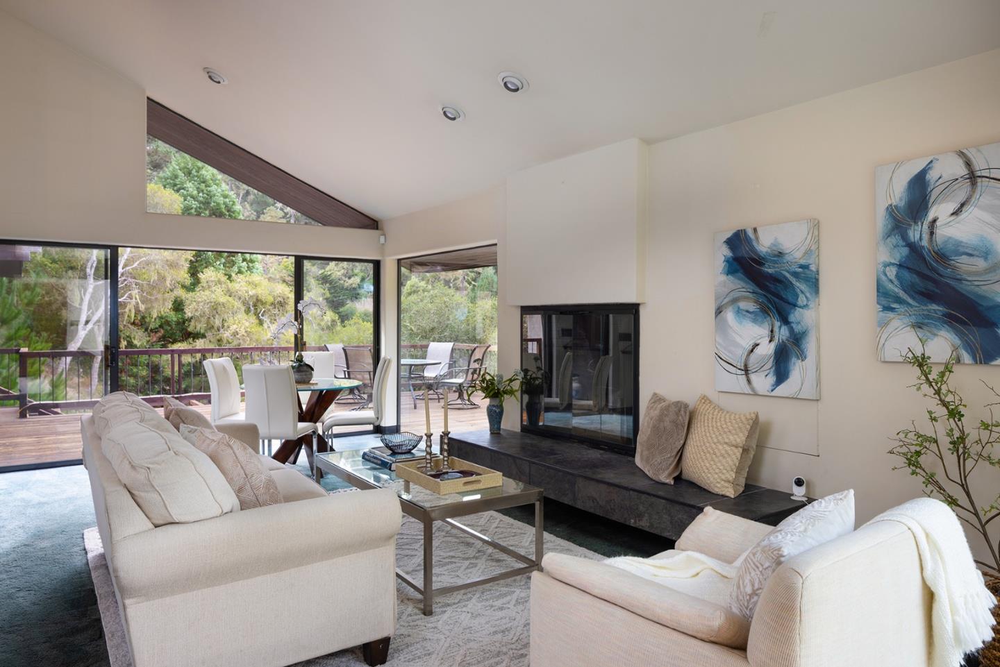 571 Viejo Road Carmel, CA 93923 - Photo 9 of 41 a living room with furniture and a large window