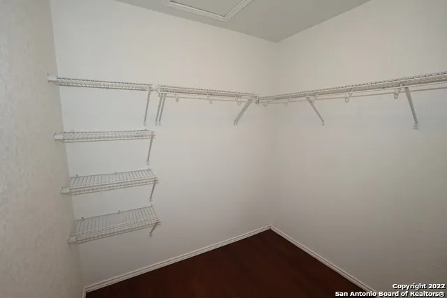 a view of an empty walk in closet