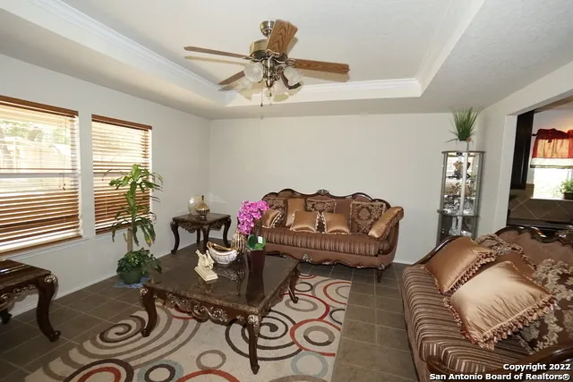 a living room with furniture and a window