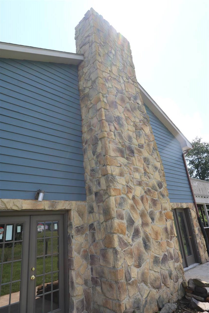 354 Mish Barn Road Middlebrook, VA 24459 - Photo 4 of 45 a brick building with a bench