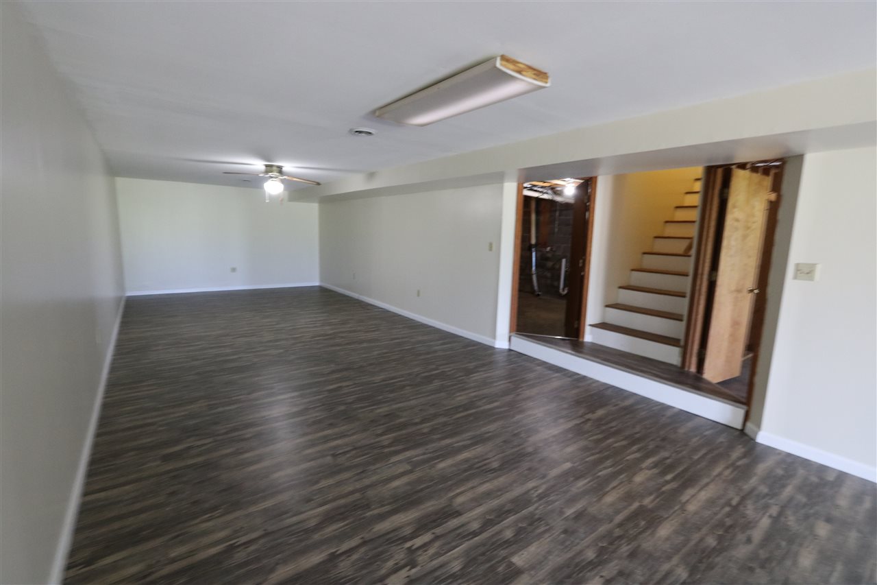 354 Mish Barn Road Middlebrook, VA 24459 - Photo 41 of 45 wooden floor in an empty room with a window