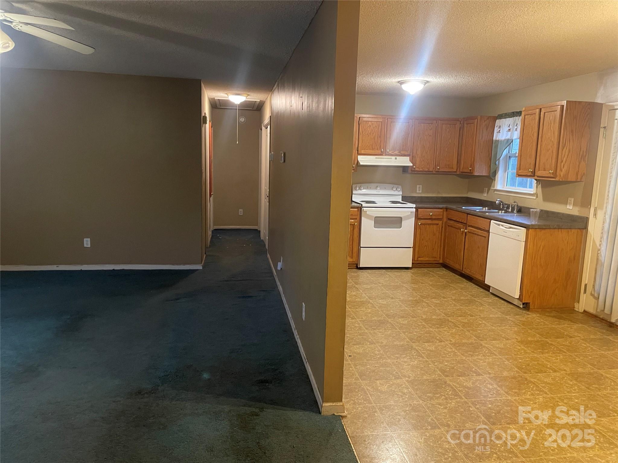 112 Ridgewood Lane York, SC 29745 - Photo 15 of 15 a kitchen with stainless steel appliances granite countertop a refrigerator a stove a sink dishwasher and a oven