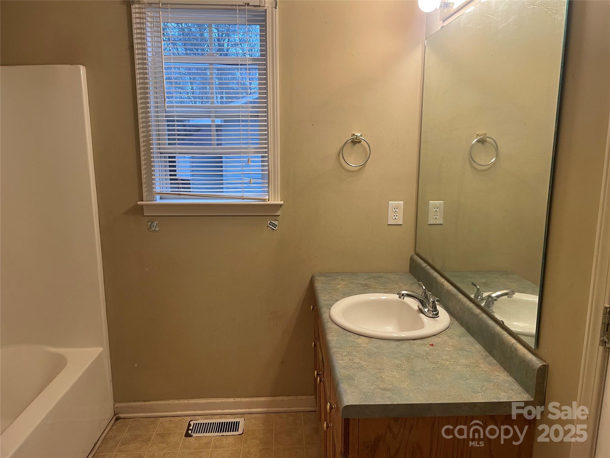 112 Ridgewood Lane York, SC 29745 - Photo 6 of 15 a bathroom with a sink and a mirror