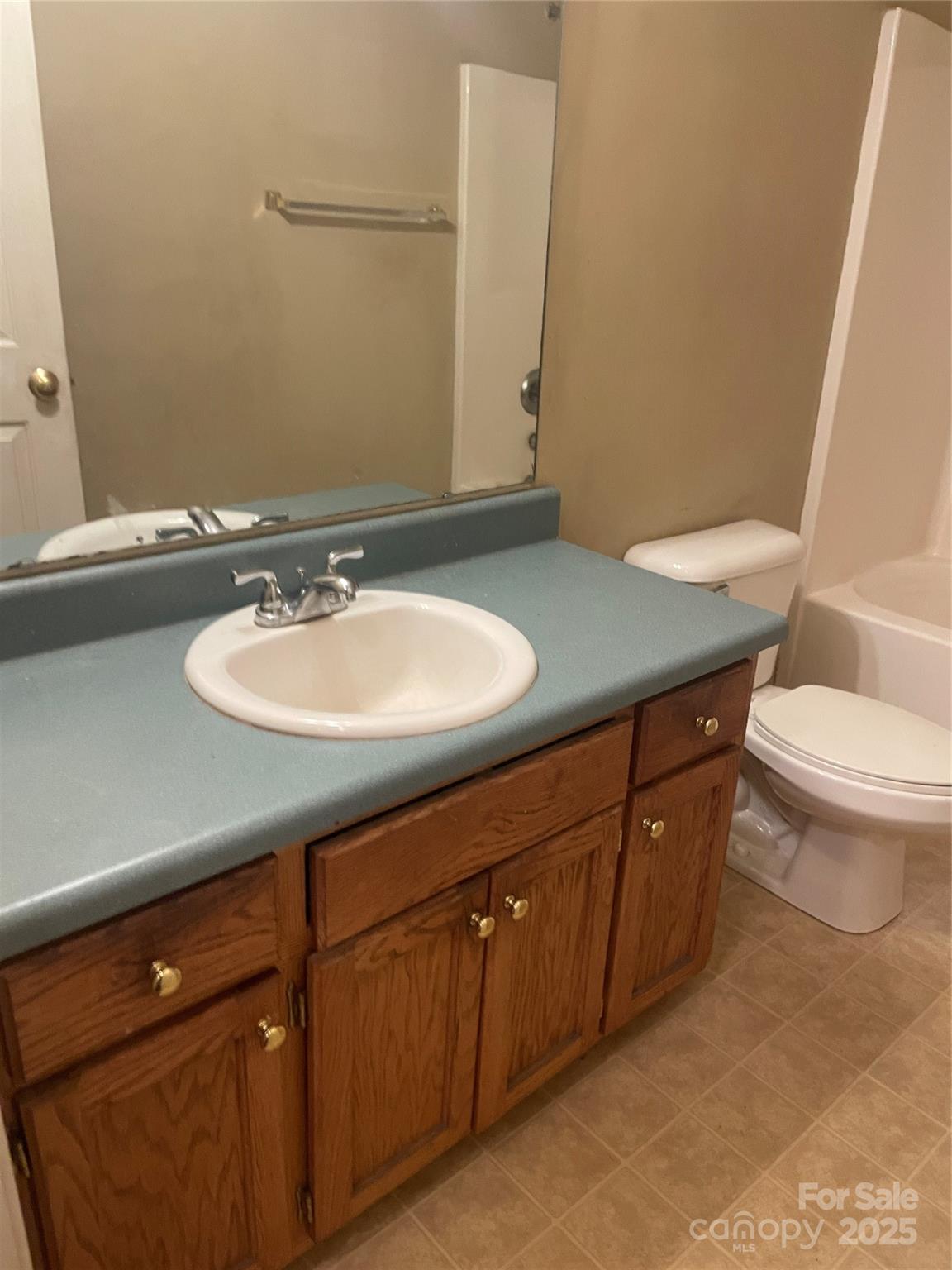 112 Ridgewood Lane York, SC 29745 - Photo 10 of 15 a bathroom with a sink and a mirror