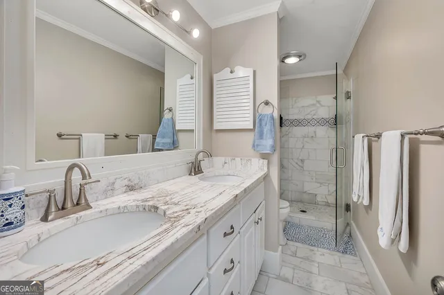 a room with pool table and windows