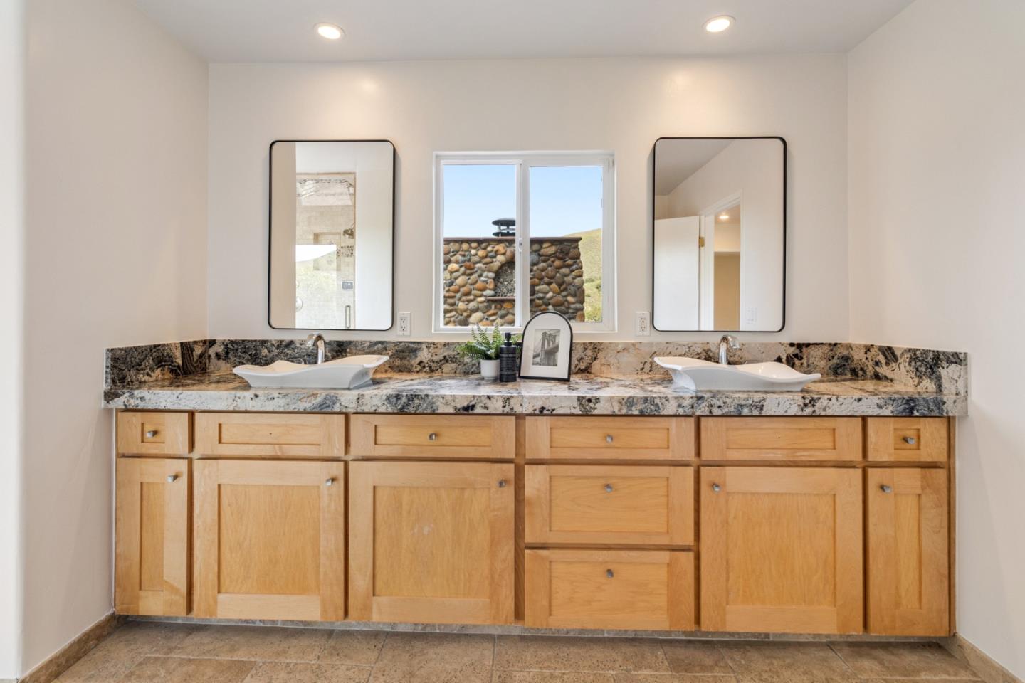 320 El Caminito Road Carmel Valley, CA 93924 - Photo 36 of 62 a bathroom with sinks mirror and vanity