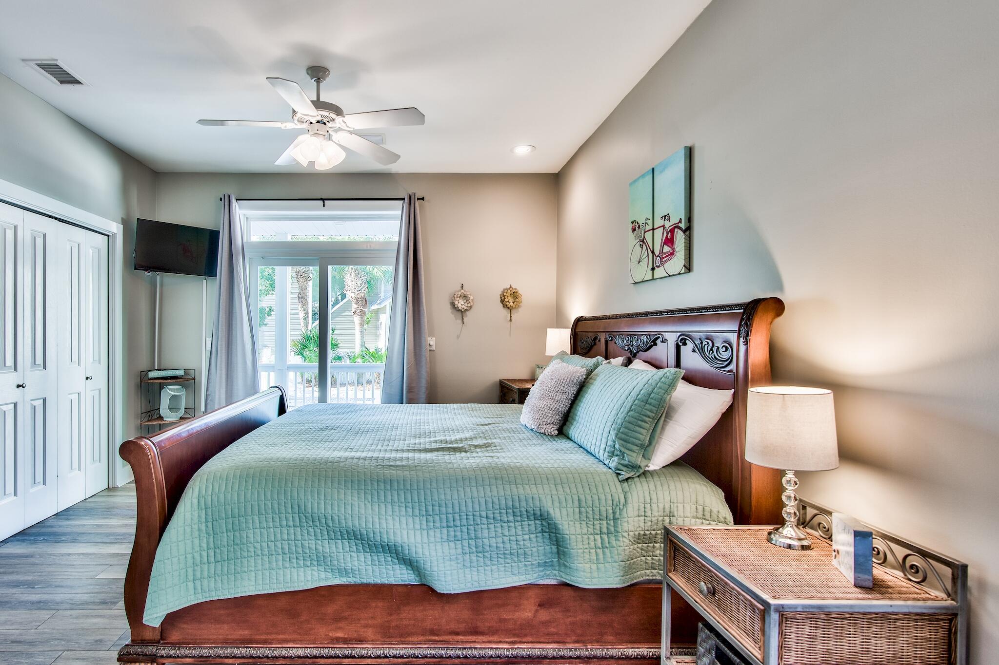 4489 Ocean View Drive Destin, FL 32541 - Photo 17 of 61 a bedroom with a bed and wooden floor