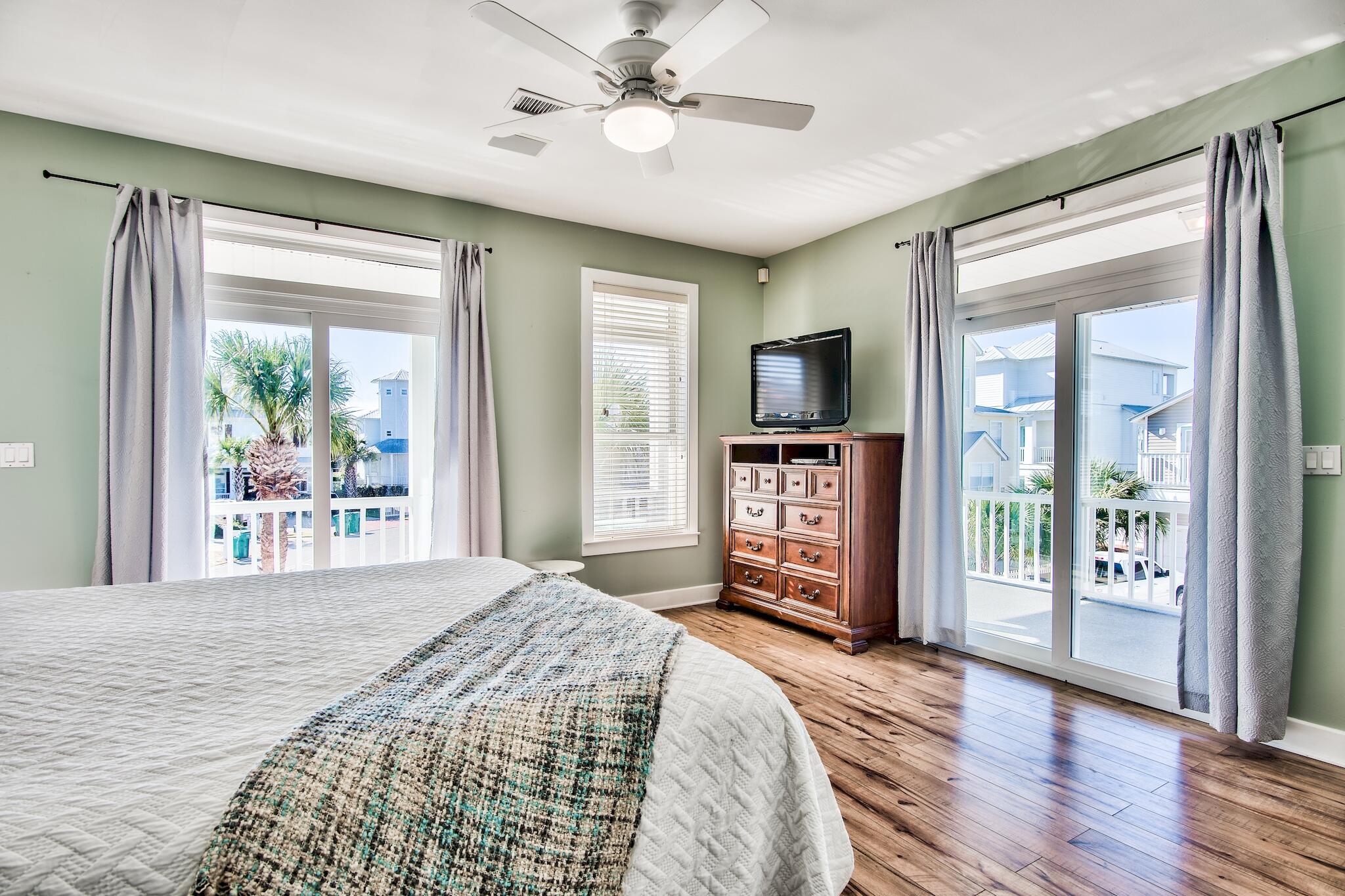 4489 Ocean View Drive Destin, FL 32541 - Photo 22 of 61 a bedroom with furniture and a flat screen tv