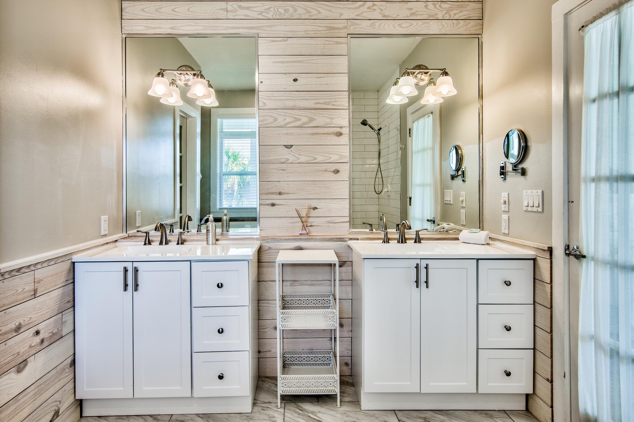 4489 Ocean View Drive Destin, FL 32541 - Photo 24 of 61 a bathroom with a double vanity sink mirror and