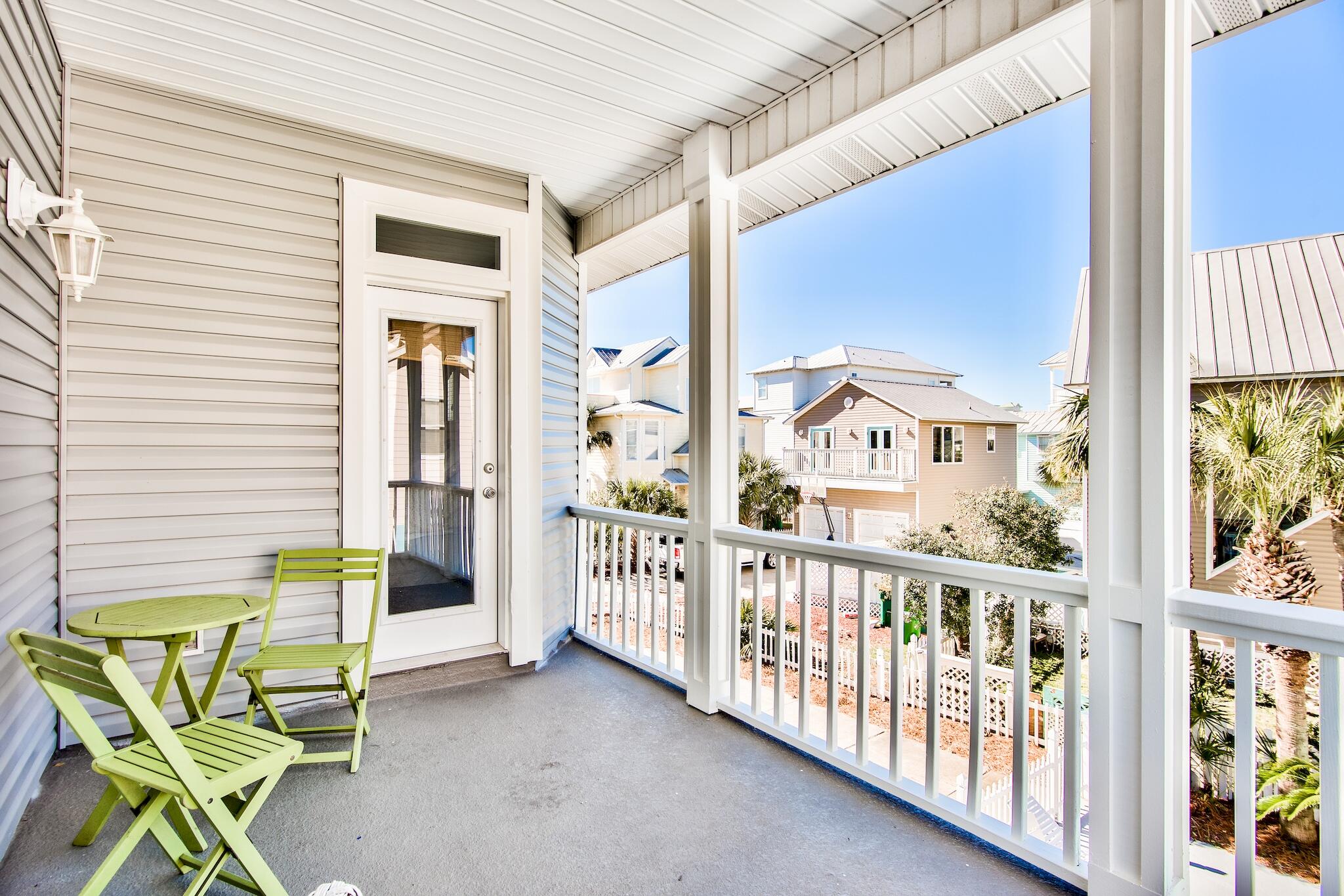 4489 Ocean View Drive Destin, FL 32541 - Photo 32 of 61 a view of a porch with chairs