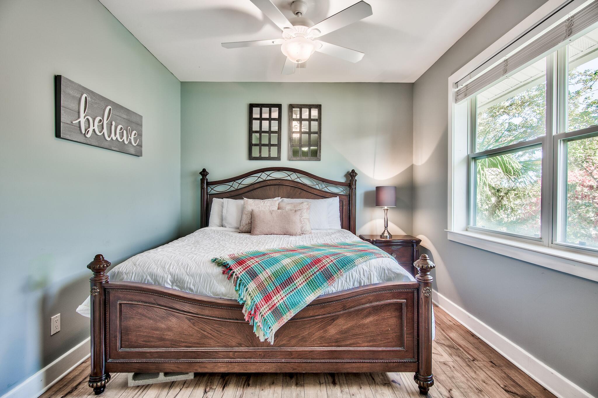 4489 Ocean View Drive Destin, FL 32541 - Photo 33 of 61 a bedroom with a bed and window