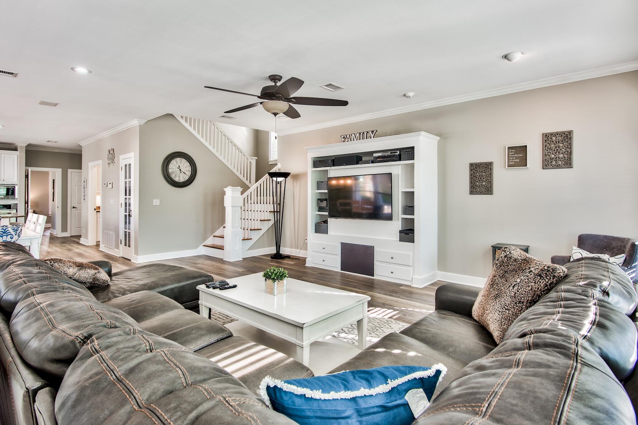 4489 Ocean View Drive Destin, FL 32541 - Photo 5 of 61 a living room with furniture and a flat screen tv