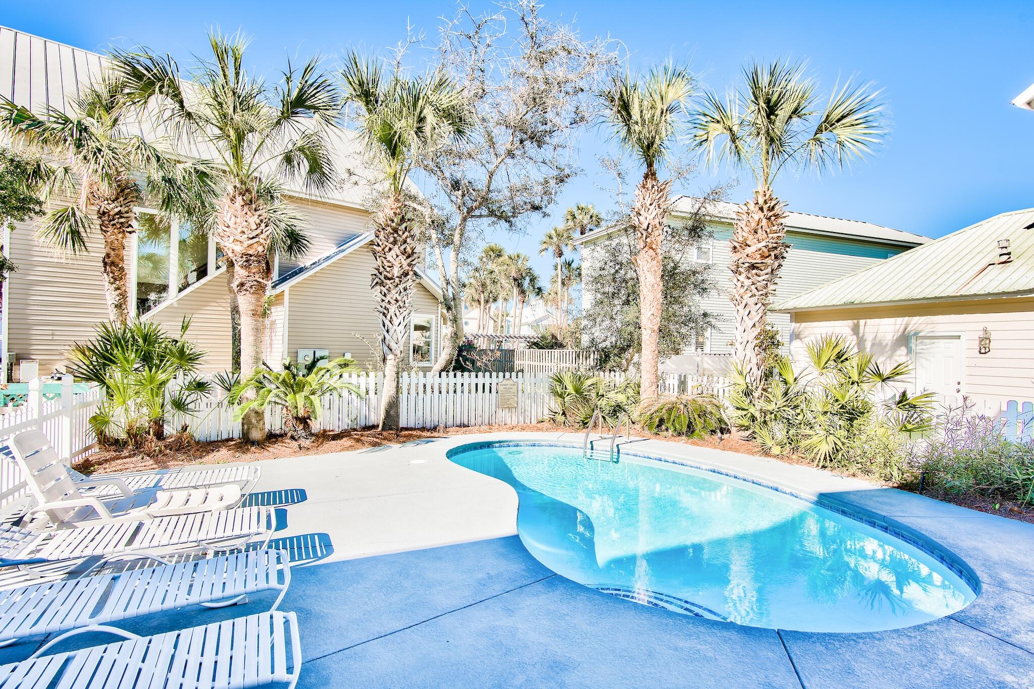 4489 Ocean View Drive Destin, FL 32541 - Photo 52 of 61 a view of a swimming pool with a patio