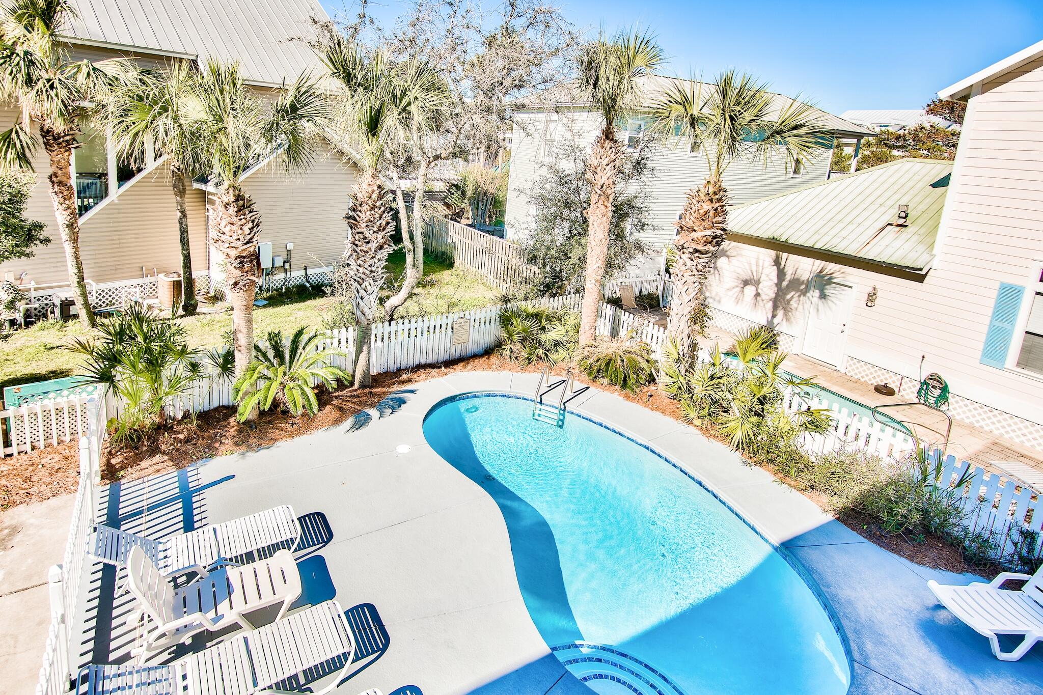 4489 Ocean View Drive Destin, FL 32541 - Photo 55 of 61 a view of a swimming pool with a patio