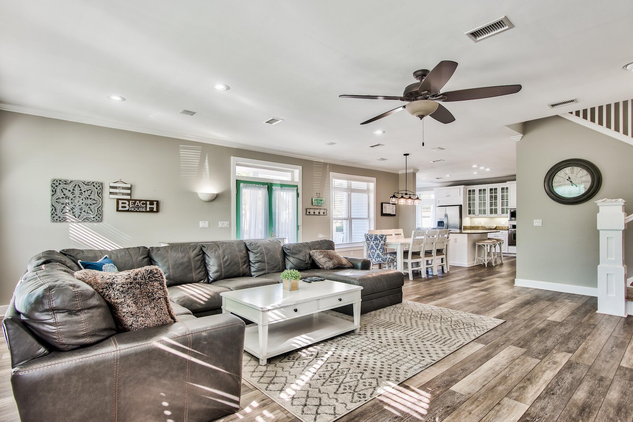 4489 Ocean View Drive Destin, FL 32541 - Photo 6 of 61 a living room with furniture and a clock