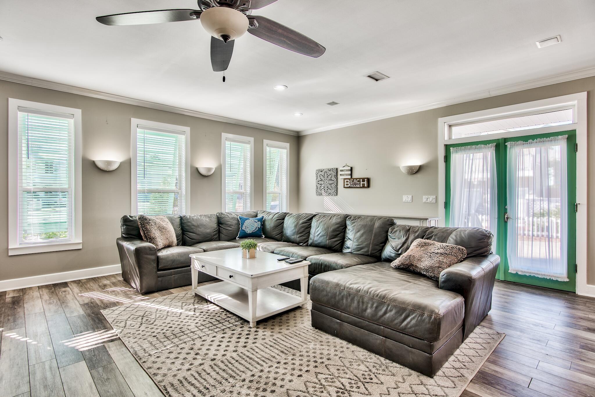 4489 Ocean View Drive Destin, FL 32541 - Photo 7 of 61 a living room with furniture and a window