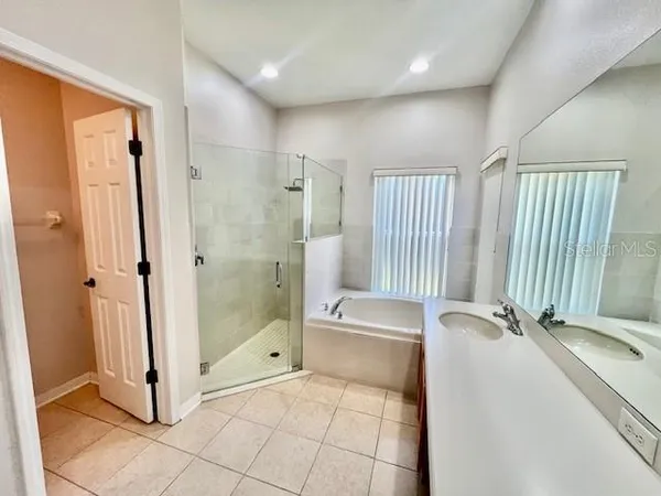 a view of a room with a trees in the background