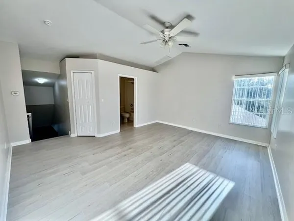 a front view of house with yard and outdoor seating