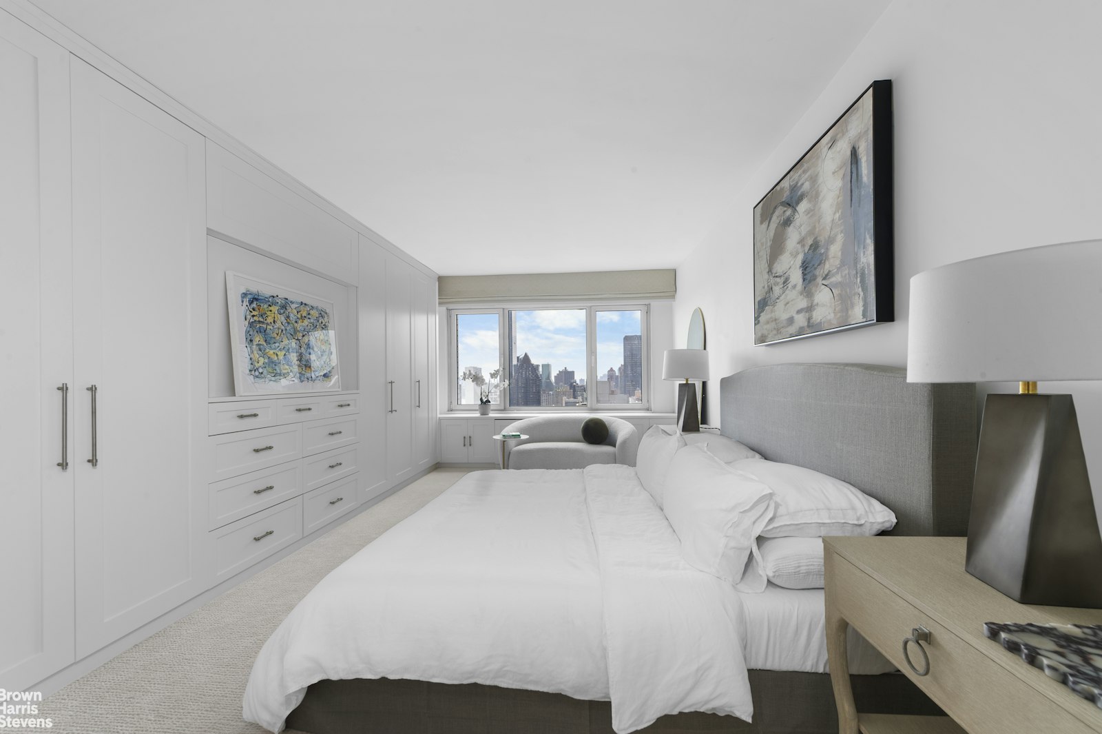 303 East 57th Street, Unit 39A Manhattan, NY 10022 - Photo 10 of 16 a large white bed in a white room
